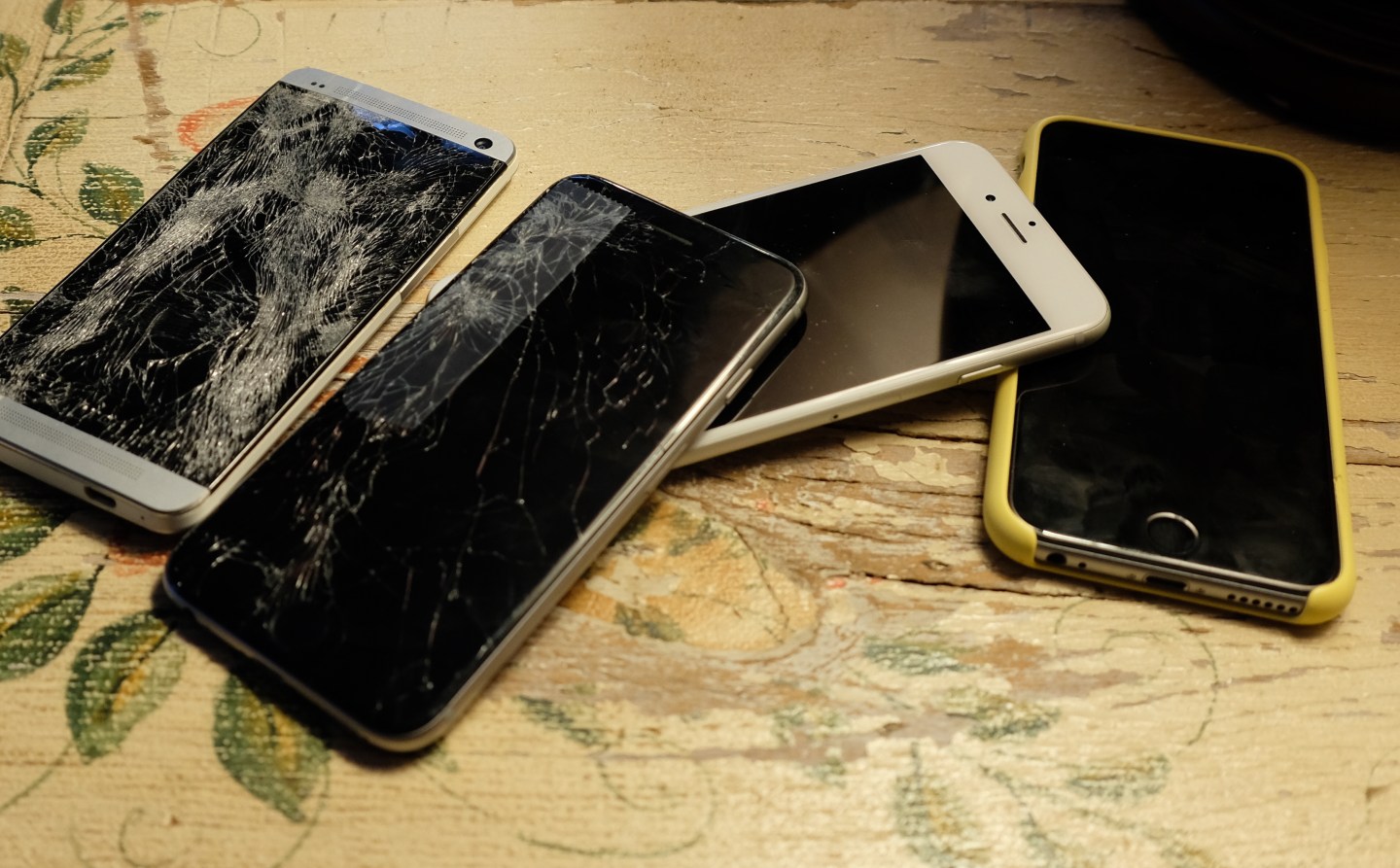 Pile of broken smartphones