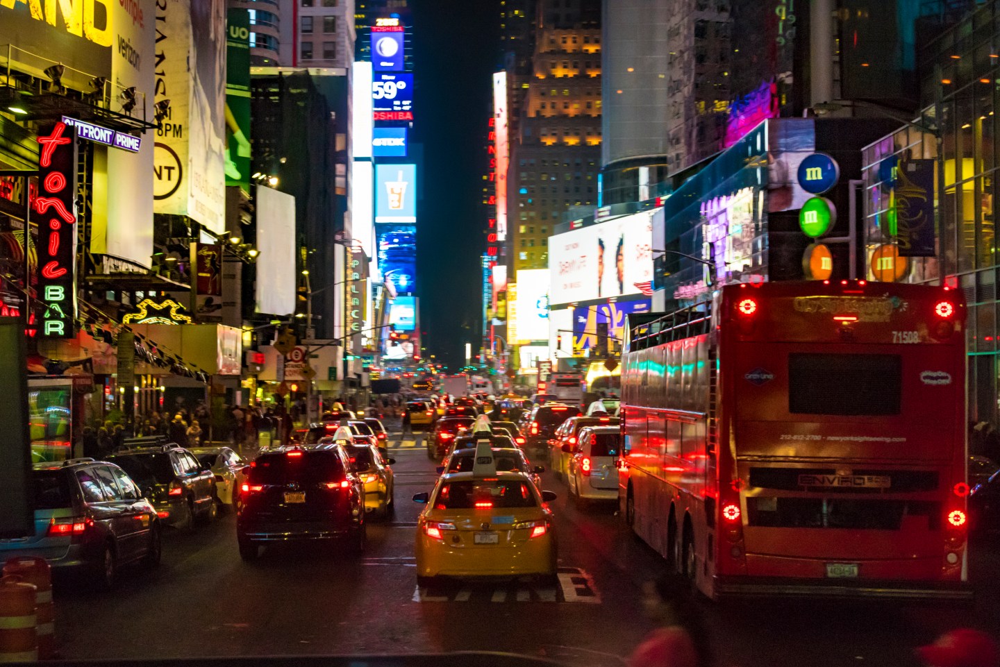 Night view of Times Square, New York city: Busy street with