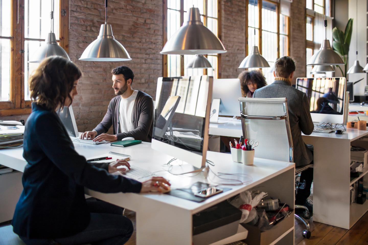Young people working on a startup office