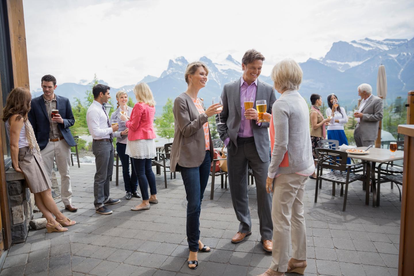 Business people talking at networking event