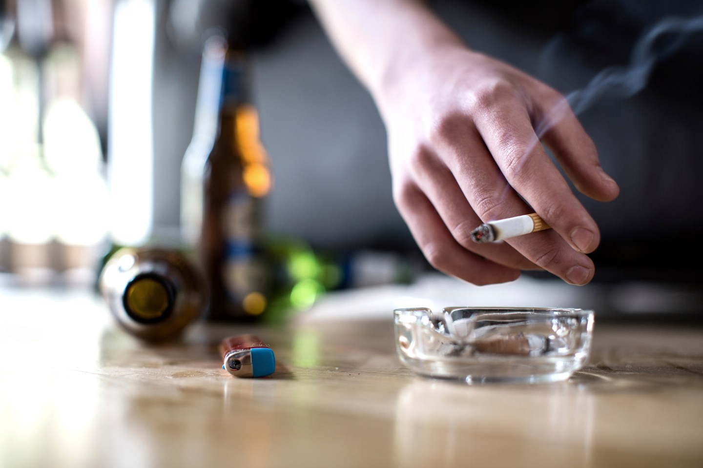 Person holding cigarette