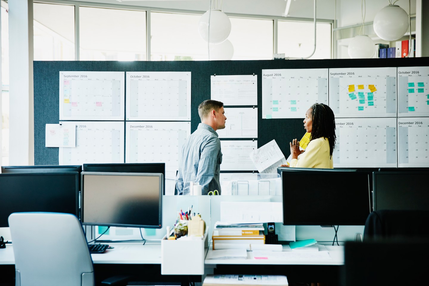 Businesswoman leading project timeline discussion