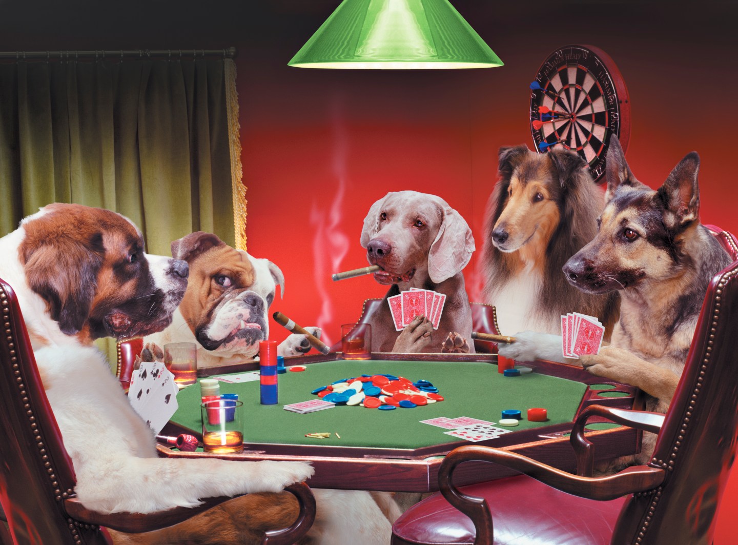 Dogs at table playing poker