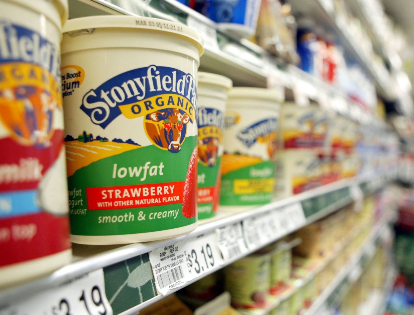 A container of Stonyfield yogurt sits on a shelf in the orga