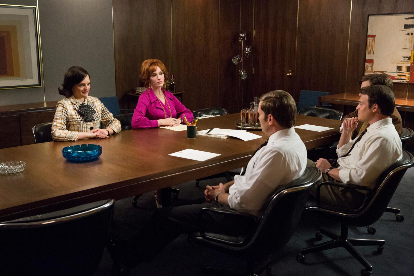 Elisabeth Moss as Peggy Olson and Christina Hendricks as Joan Harris - Mad Men _ Season 7B, Episode 8 - Photo Credit: Michael Yarish/AMC