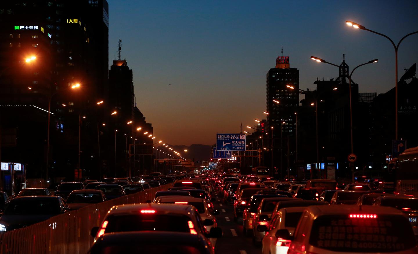 Cars stand bumper to bumper in the evening rush hour traffic jam in central Beijing