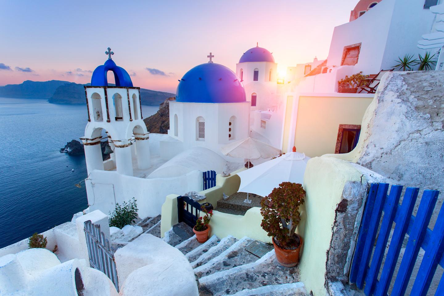 Blue domed churches at sunset, Oia, Santorini