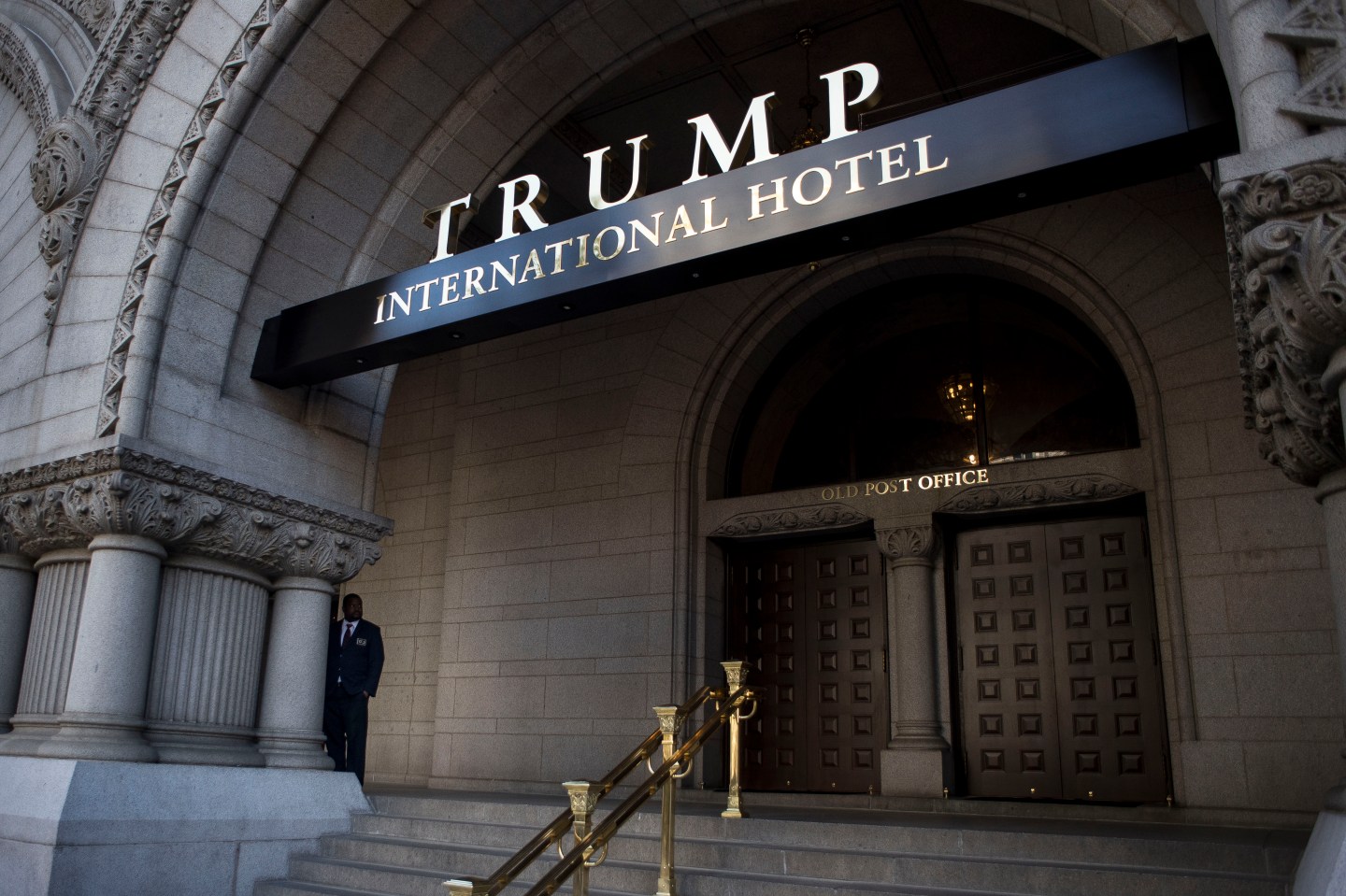 Anti-Trump Activists Protest Outside Of Trump International Hotel Opening Ceremony