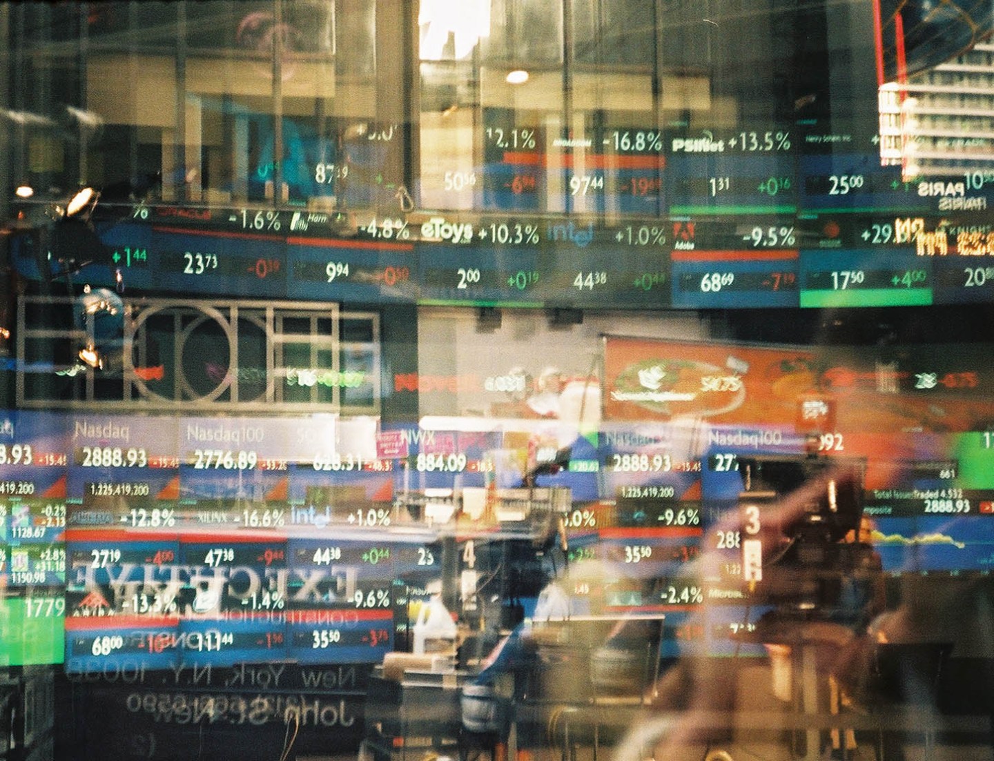Reflection Of Financial Figures On Glass