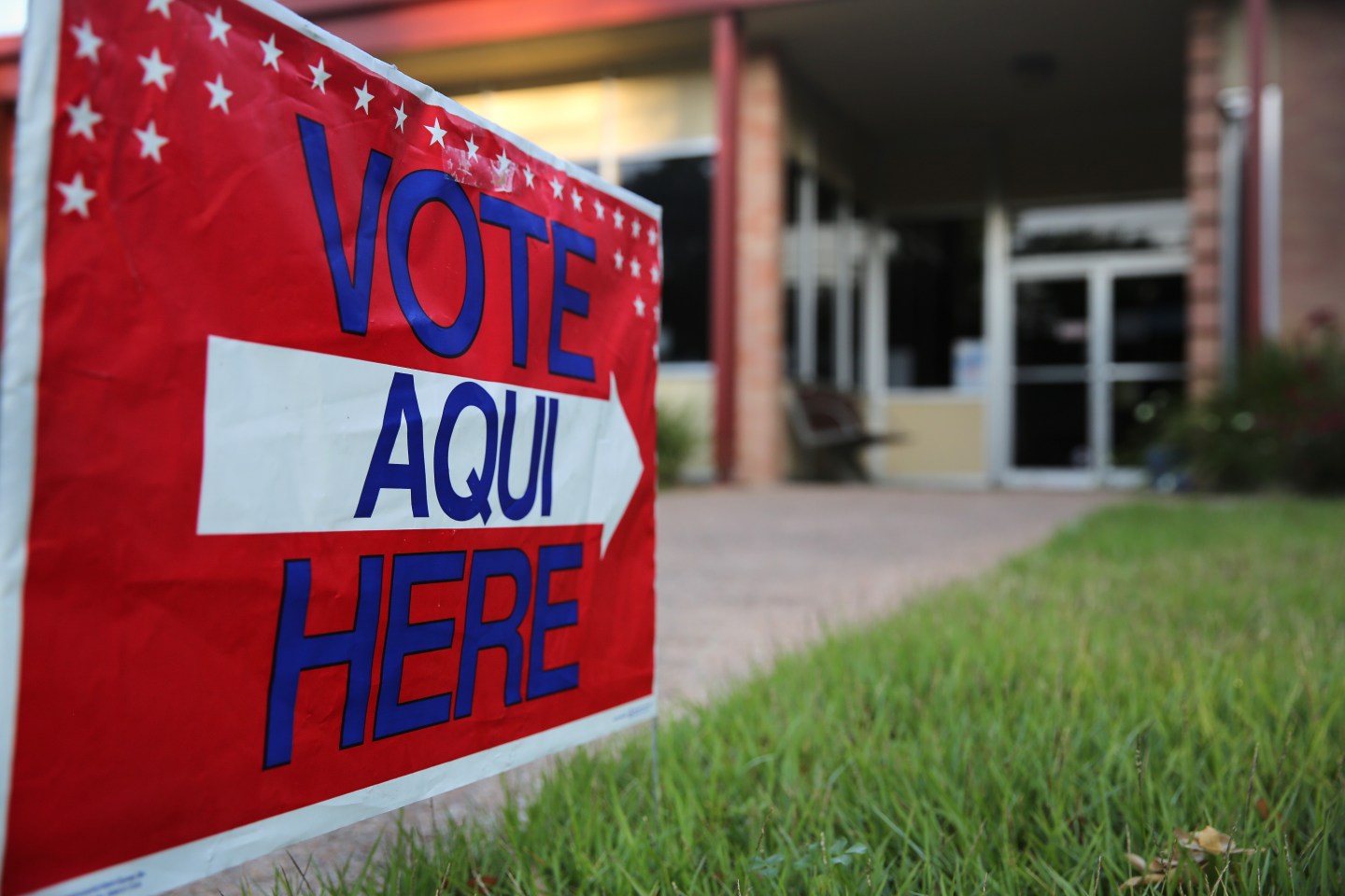 English-Spanish Signs Front Election Center In Texas