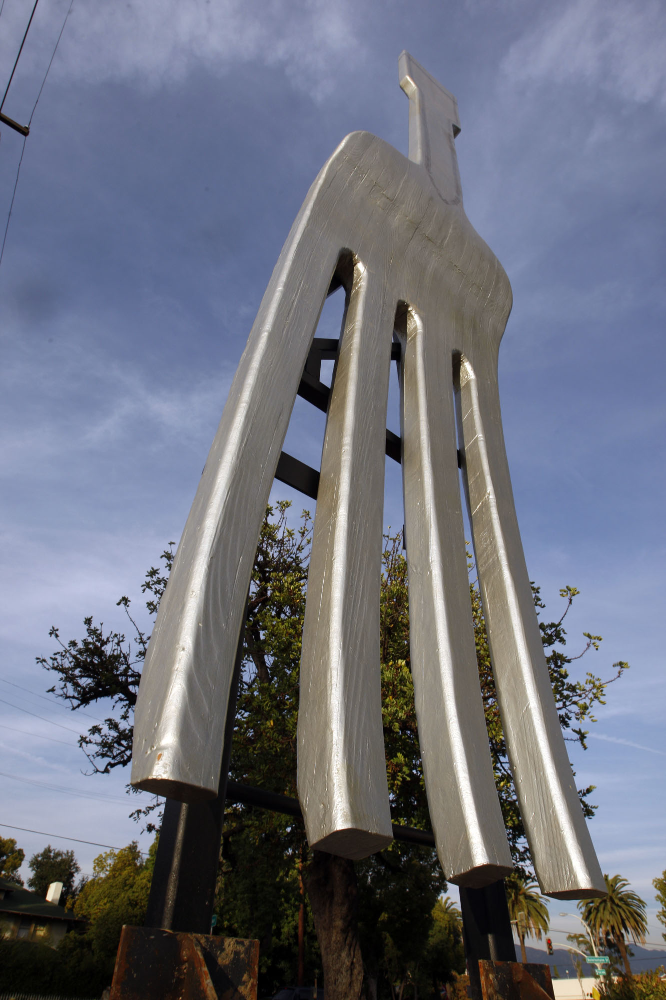 A 18' fork as a work of art at the intersection of St John Ave/Pasadena Ave and Bellefontaine St in