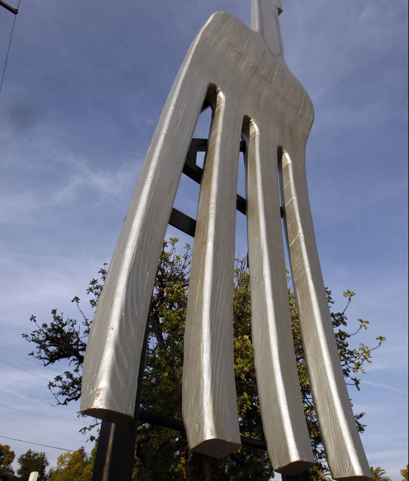 A 18' fork as a work of art at the intersection of St John Ave/Pasadena Ave and Bellefontaine St in