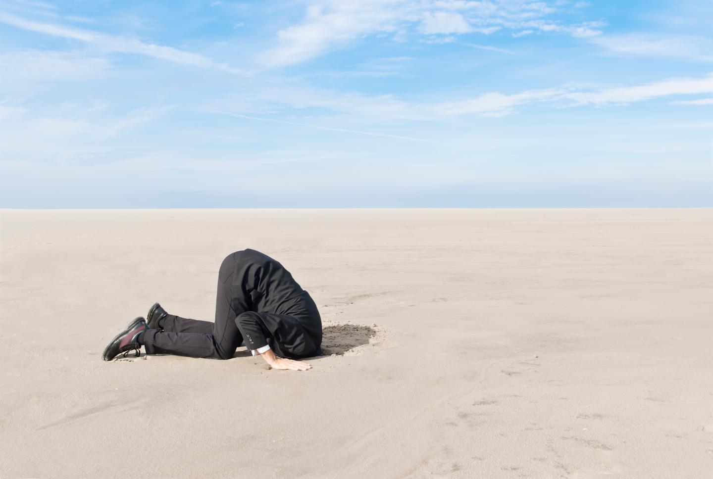 Hiding head in sand