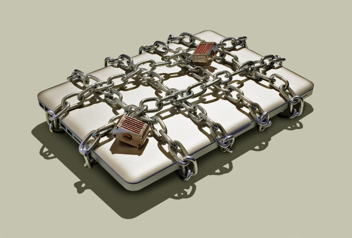 Laptop with chains and padlocks.
