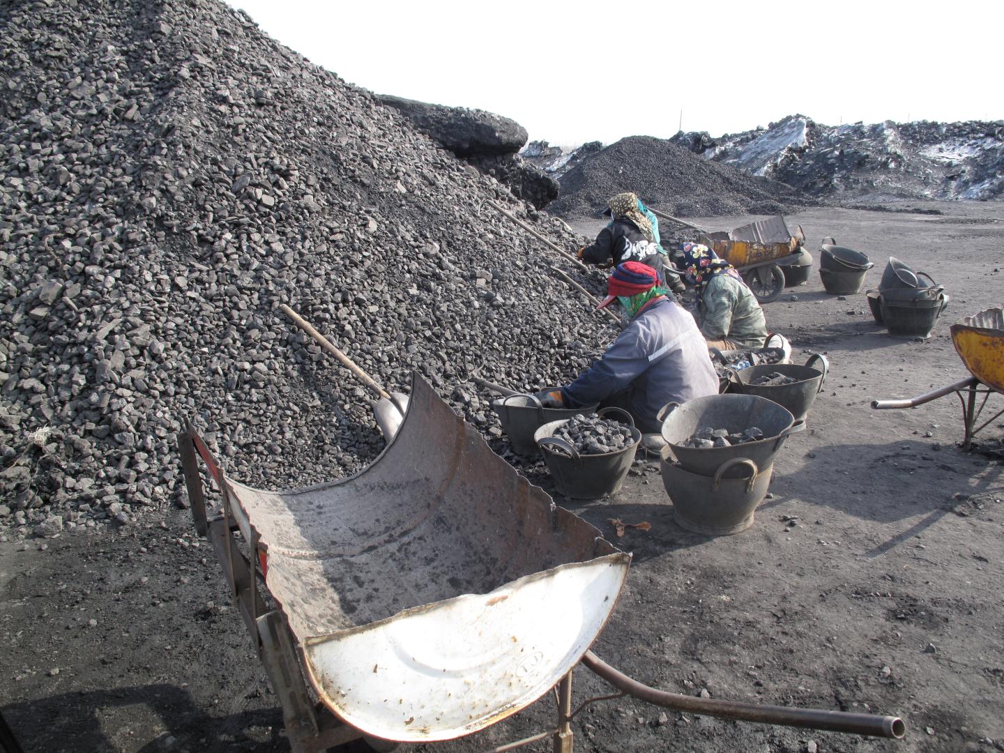 Workers are seen at Shuangyashan Mine, owned by Longmay Group, in Shuangyashan