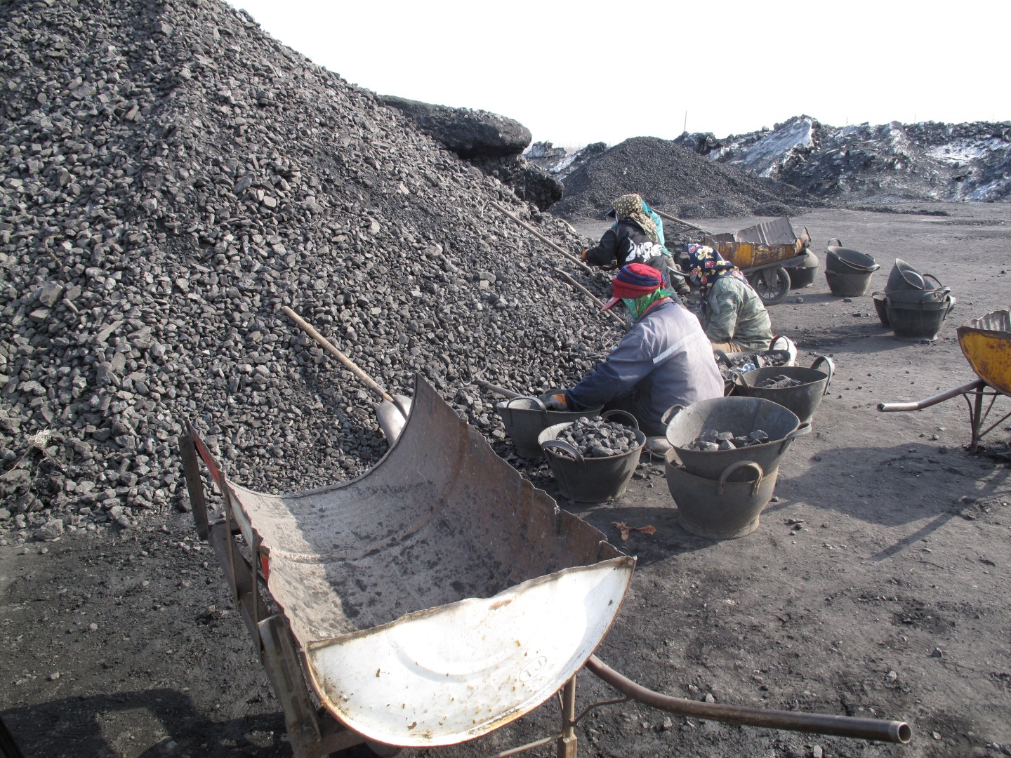 Workers are seen at Shuangyashan Mine, owned by Longmay Group, in Shuangyashan