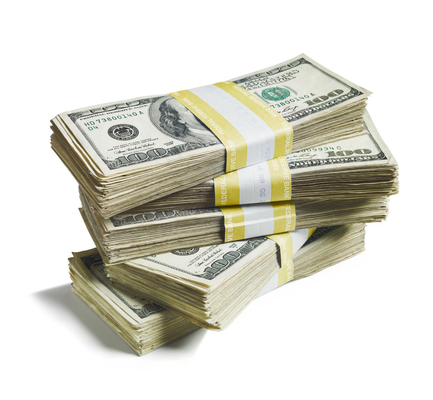 A stack of bundled of 100 US dollar bills