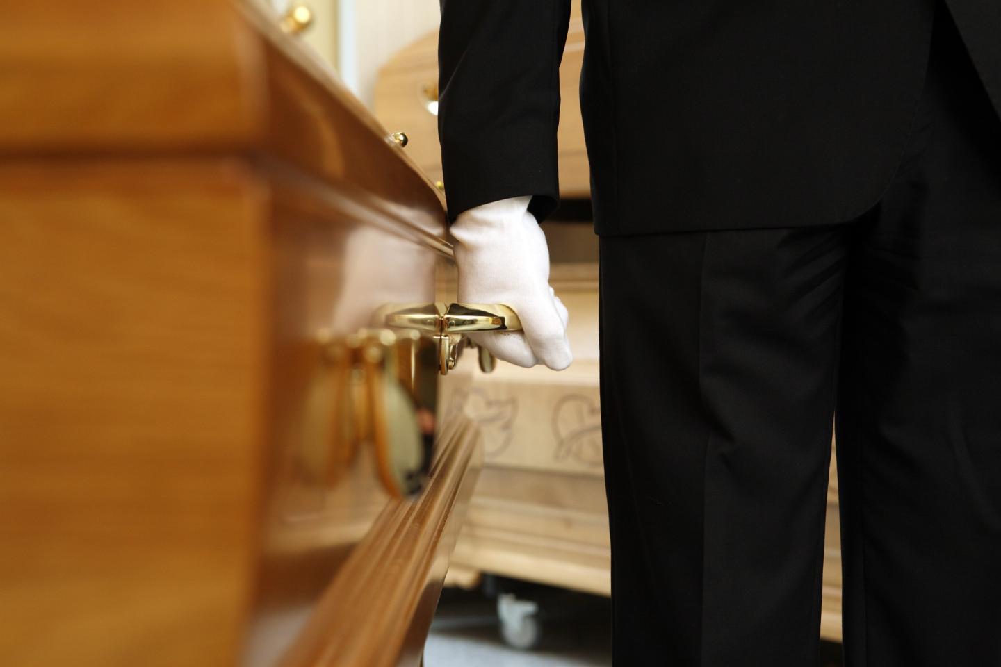 funeral parlour, coffin bearer