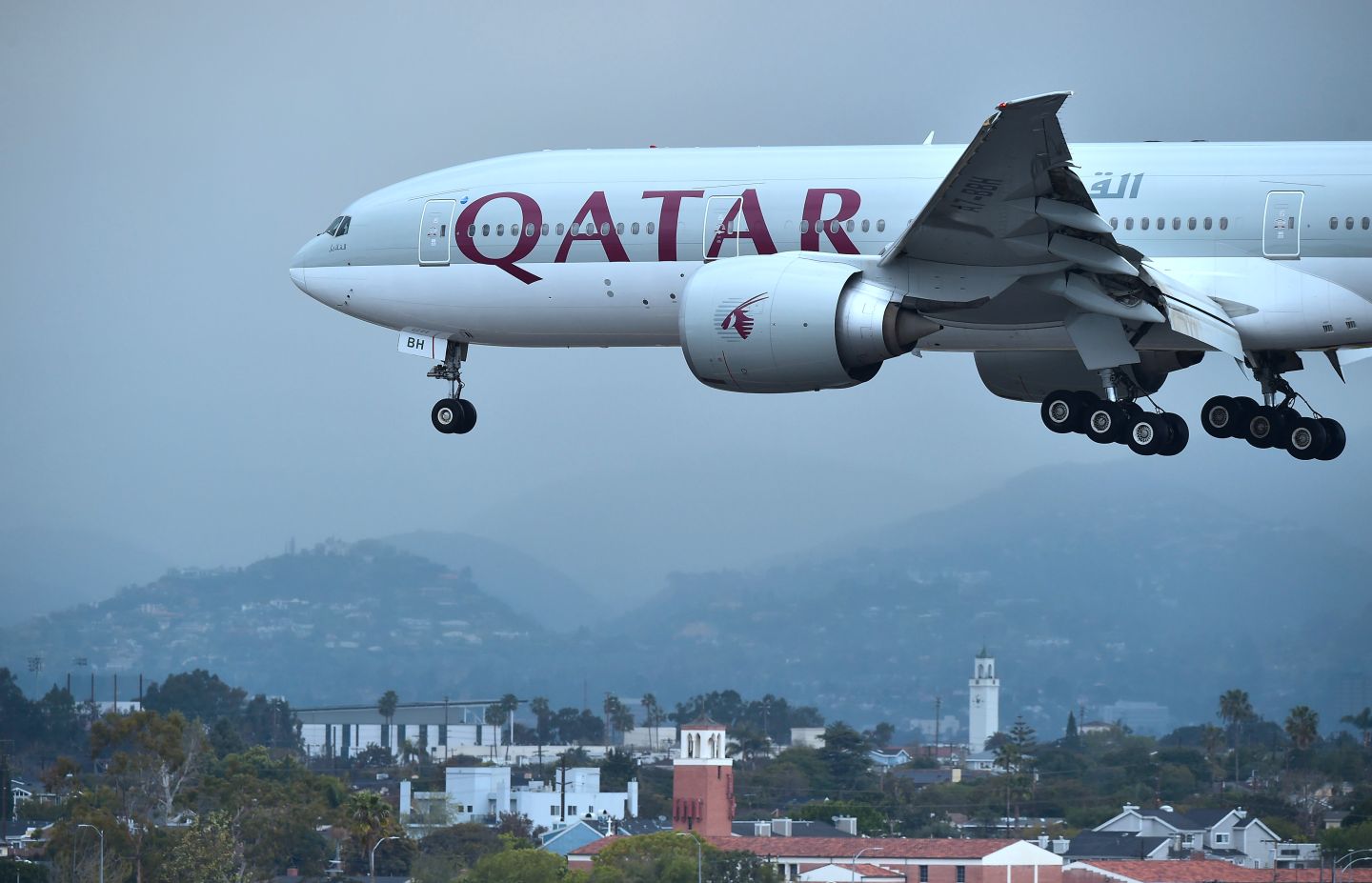 A Qatar Airways aircraft, flight 739 from Doha, comes in for a landing at Los Angeles International Airport on March 21, 2017 in Los Angeles, California.
