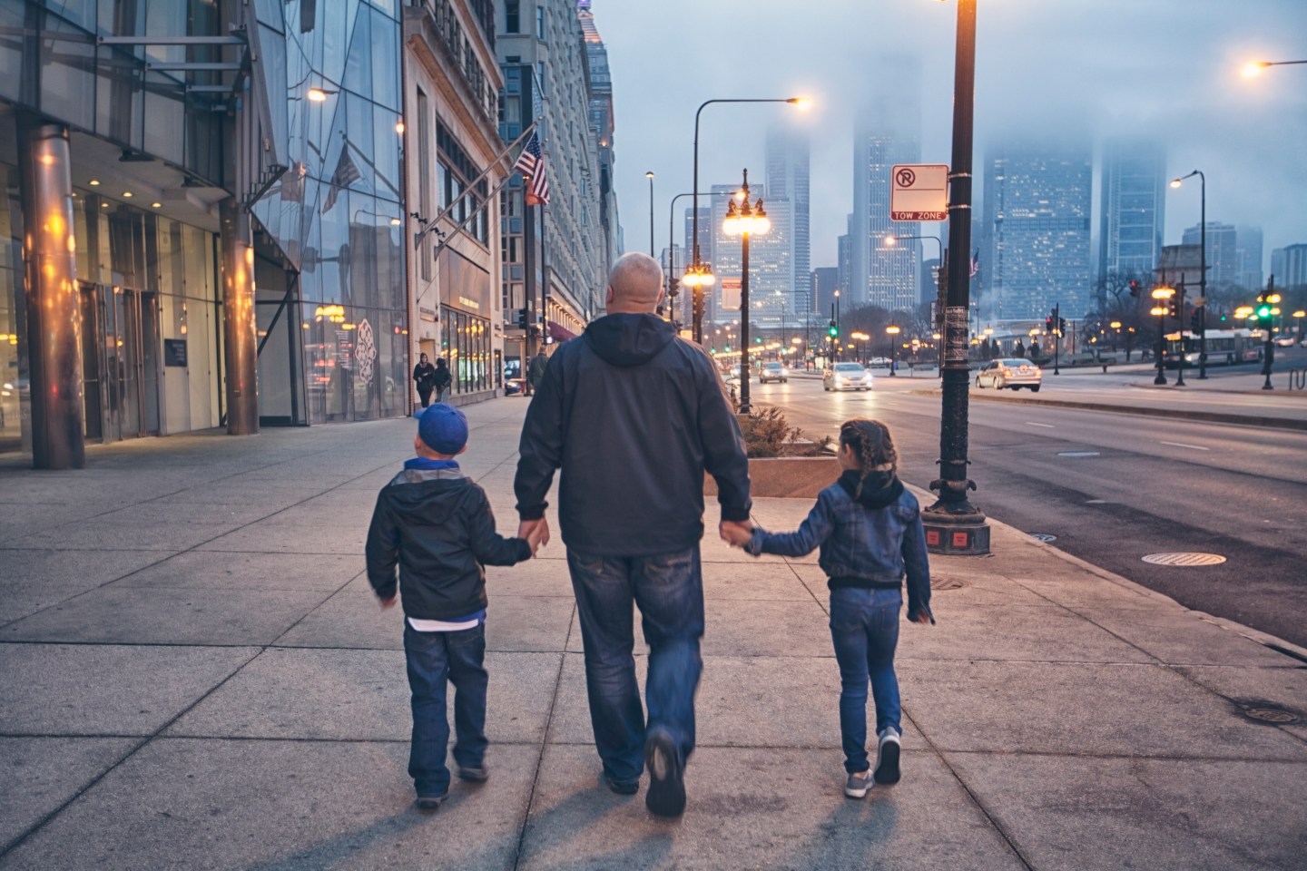 family walking down Michigan Avenue in Chicago
