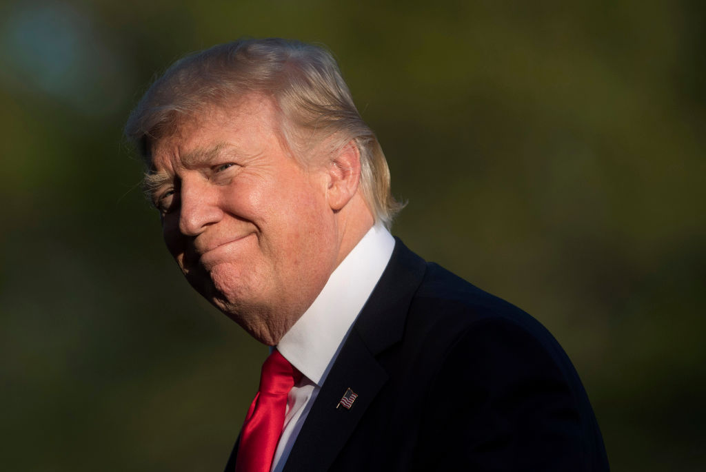 U.S. President Donald Trump returns to the White House, April 18, 2017, in Washington.