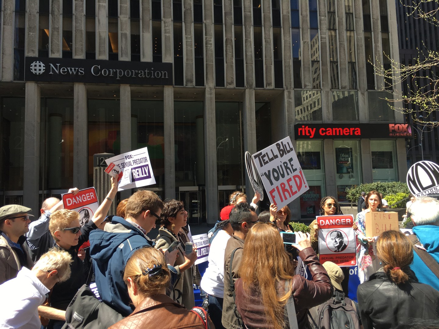 Protestors gather in front of Fox News Headquarters on April 18, 2017 to protest Bill O'Reilly's employment at the company.