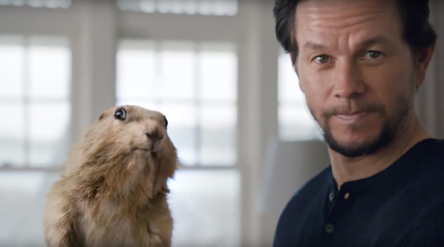 AT&T television commercial features actor Mark Wahlberg and a prairie dog.