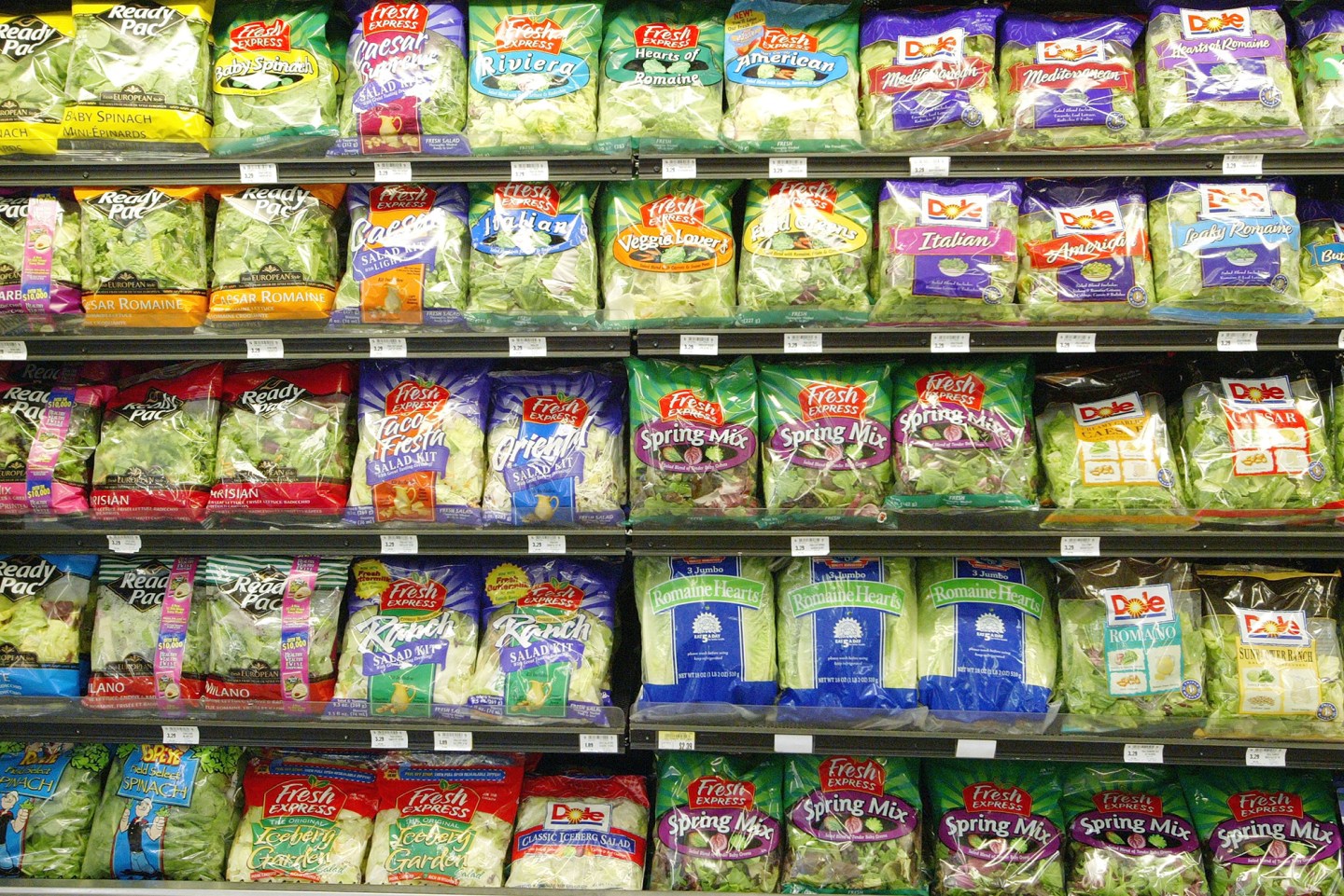 Pre-packaged salad sits on the shelf at a grocery store, on June 19, 2003 in San Francisco, Calif.
