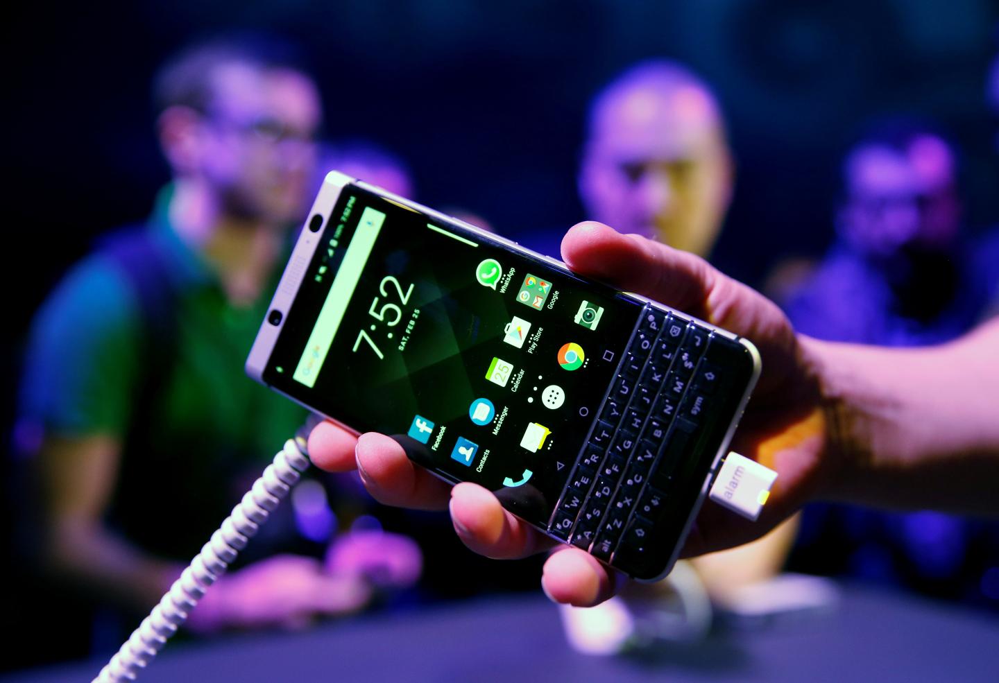 A man holds the new BlackBerry Key One before the Mobile World Congress in Barcelona