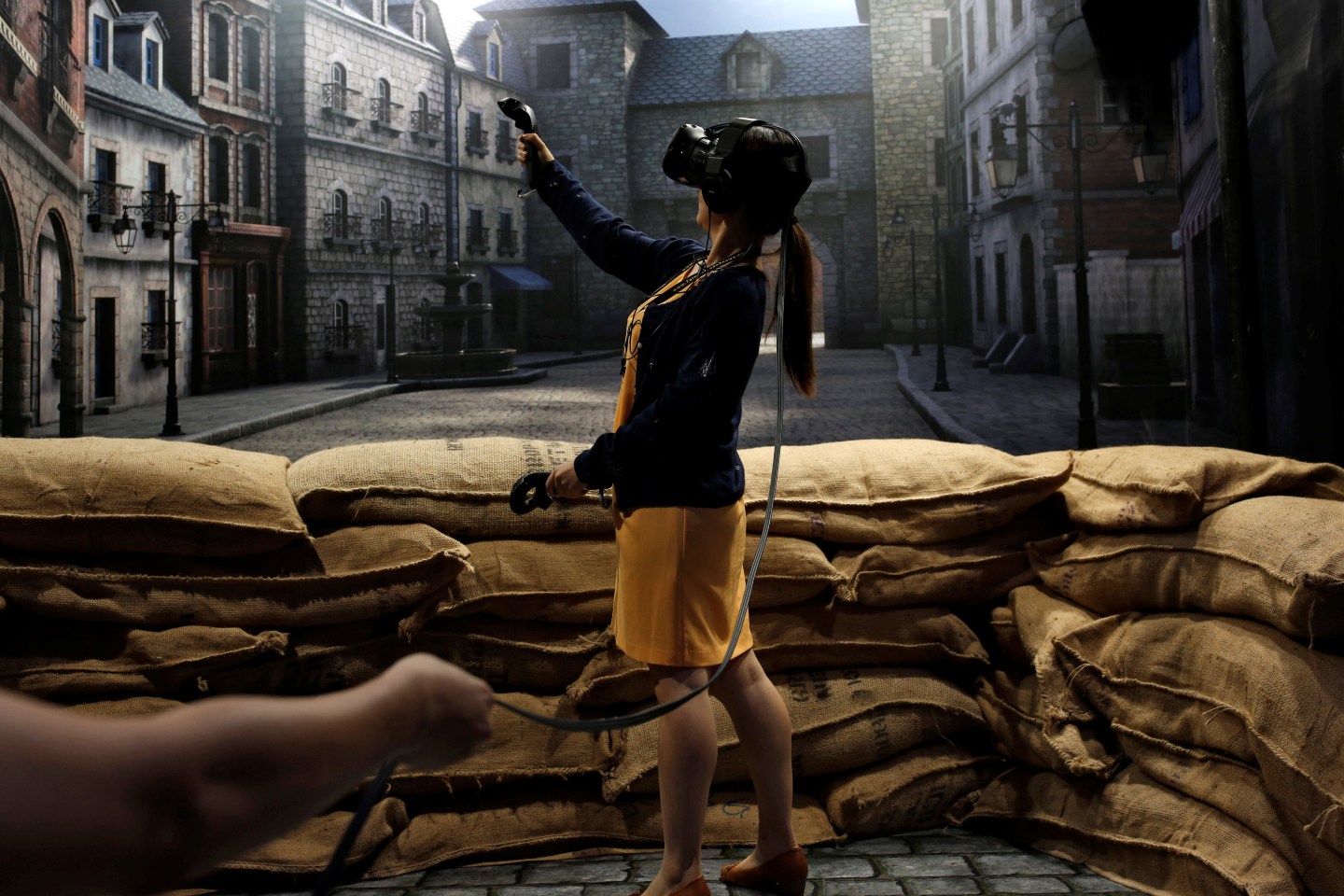 A visiter tries a pair of HTC's Vive Virtual Reality (VR) goggles, during the annual Computex computer exhibition in Taipei