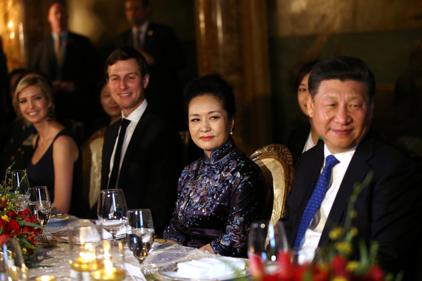 China's first lady Peng Liyuan looks at Chinese President Xi Jinping as she sits next to Trump Senior Advisor Jared Kushner and Ivanka Trump in West Palm Beach
