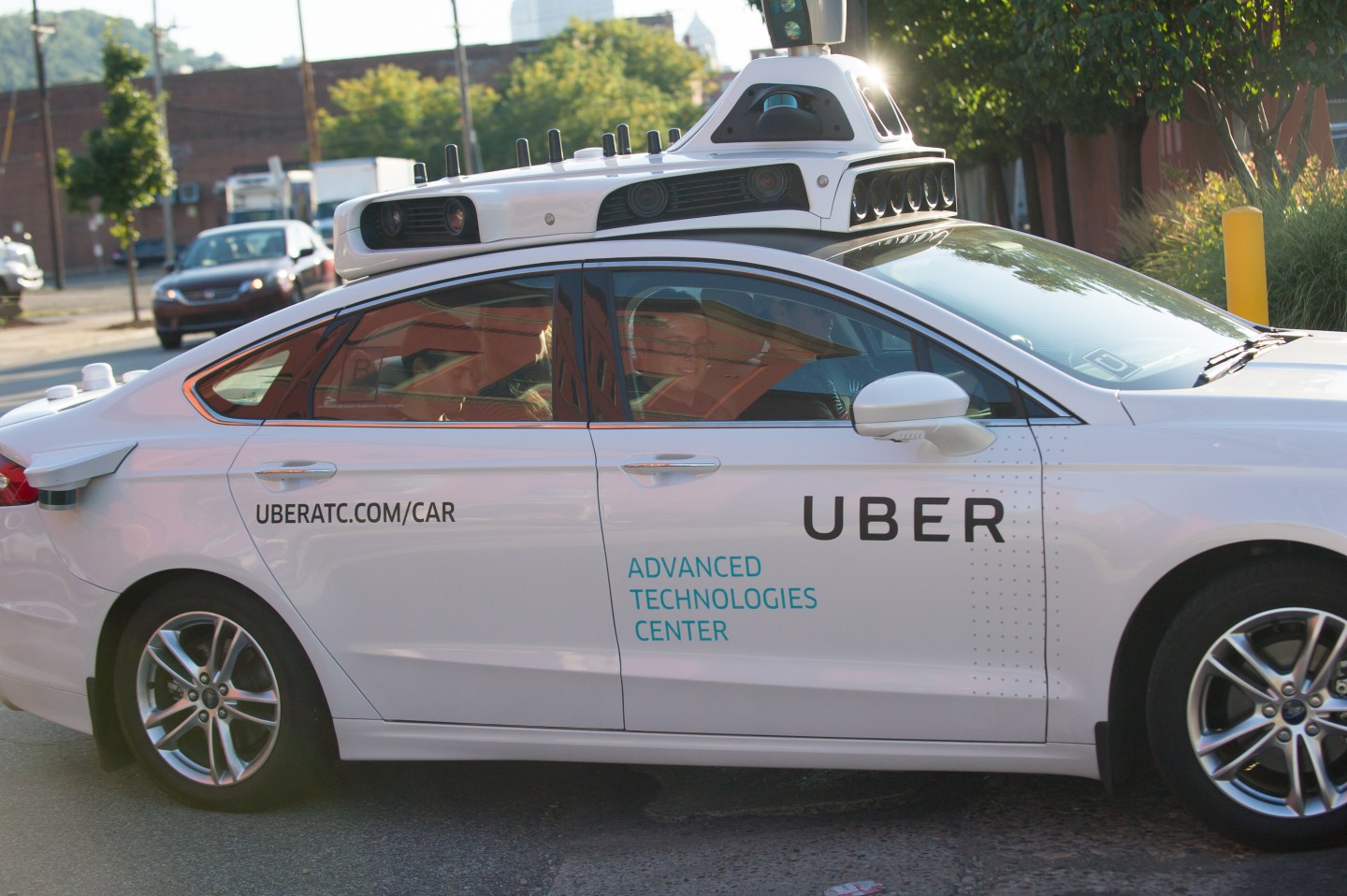 An Uber self-driving car in Pittsburgh. The ride-sharing company is opening a research office in Toronto, Canada.