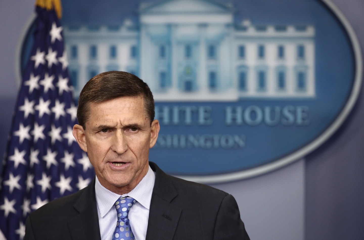 Three former administration officials say President Barack Obama warned Donald Trump against hiring Michael Flynn as national security adviser.