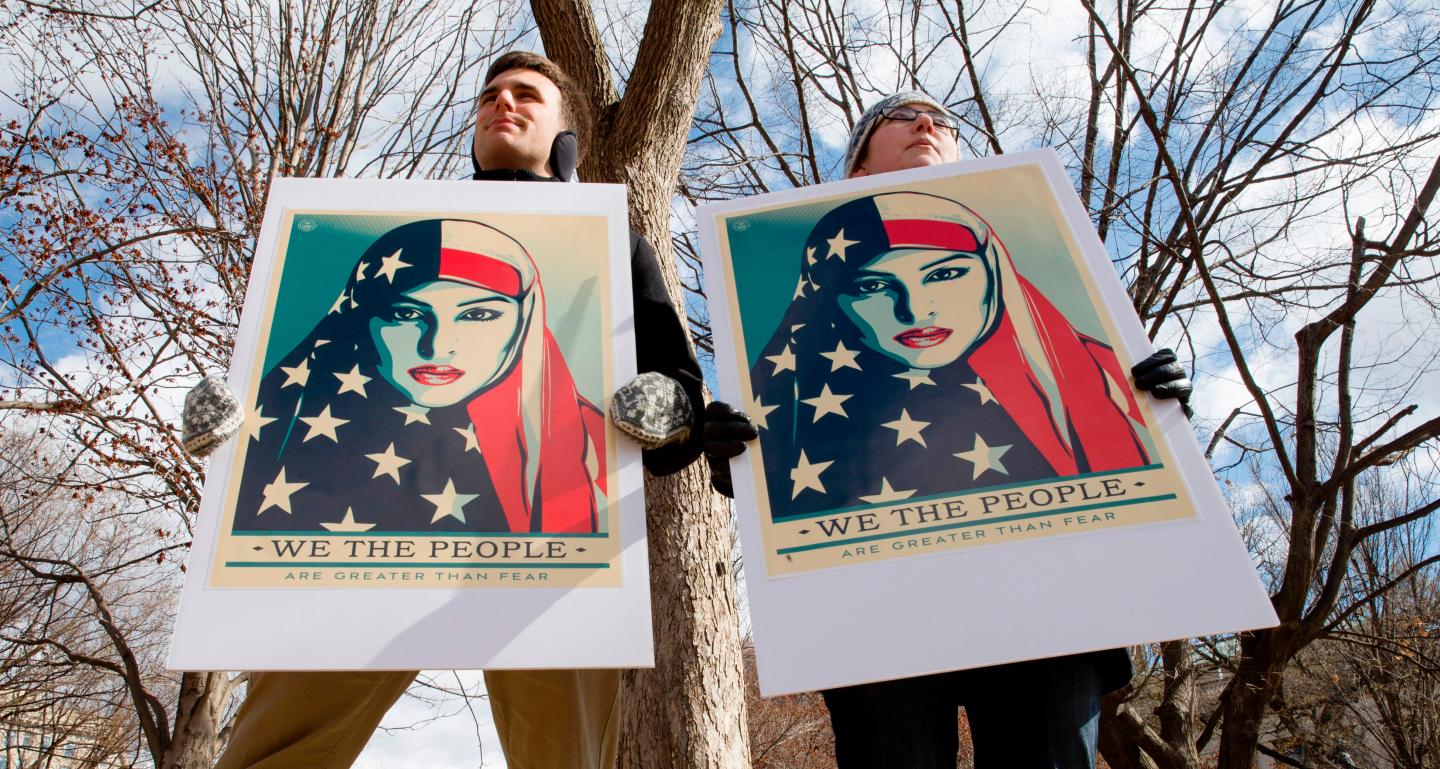 Demonstrators gather near The White House to protest President Donald Trump's travel ban on six Muslim countries on March 11, 2017 in Washington, D.C.