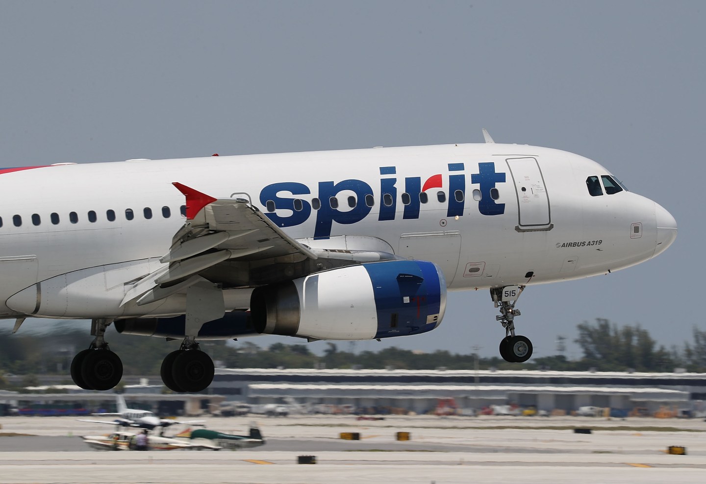 A Spirit Airlines plane lands at the Fort Lauderdale-Hollywood International Airport on May 9, 2017 in Fort Lauderdale, Fla.