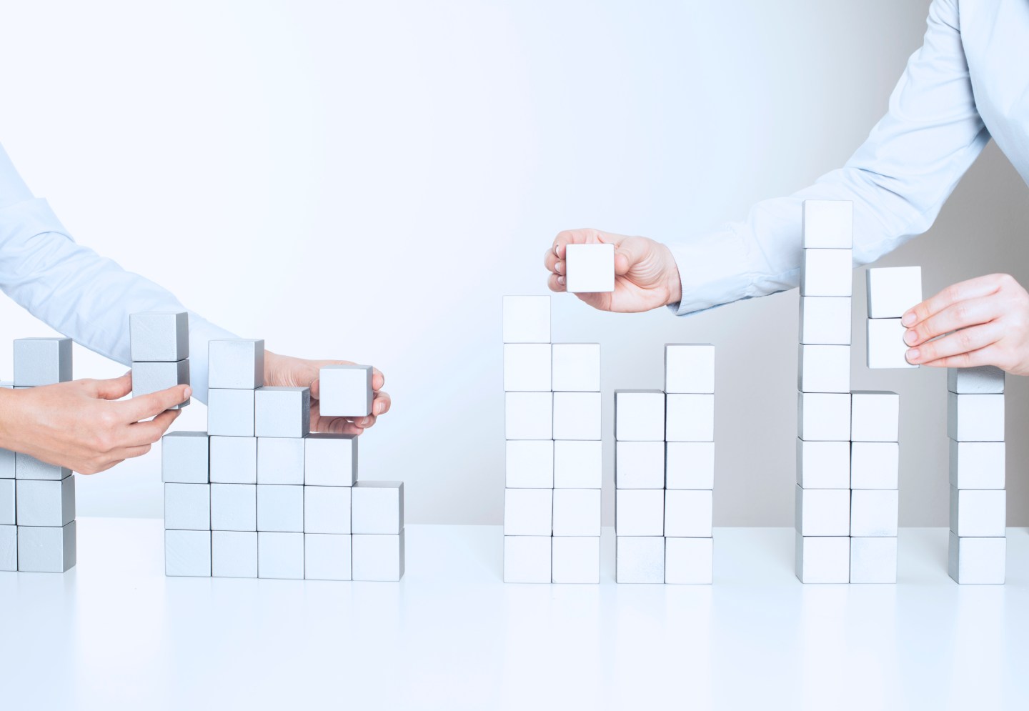 Two business woman building a project