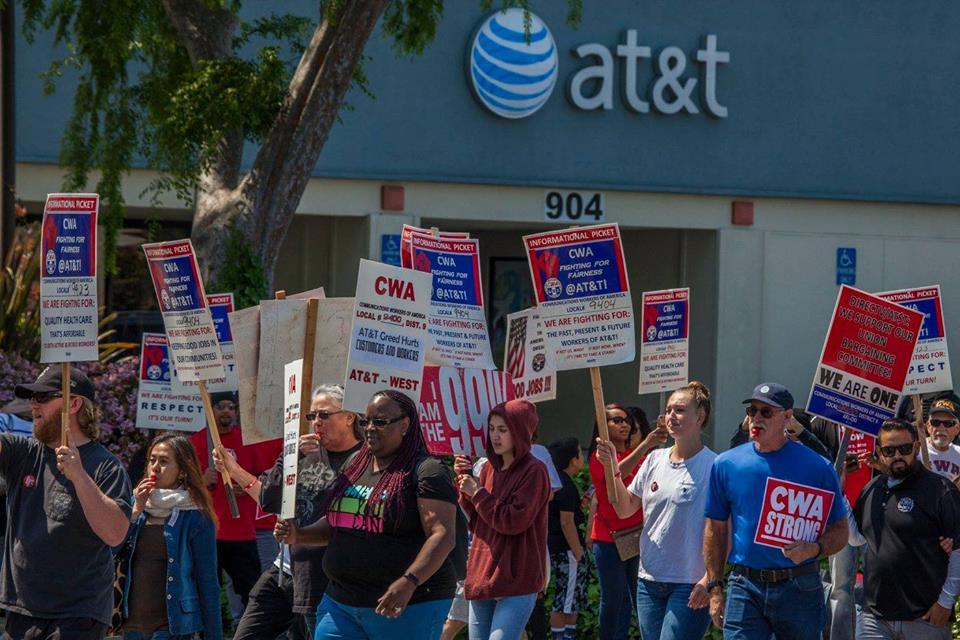 AT&T workers in the Communications Workers of America union protest during contract talks.