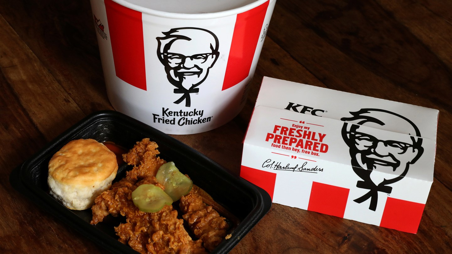 Kentucky Fried Chicken (KFC) tenders, a bucket and box of chicken are seen in this picture illustration