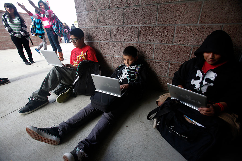 Pinacate Middle School students Jacob Quinino, 13, Brian Guereque, 12 and Joshua Ortega, 12, l to r
