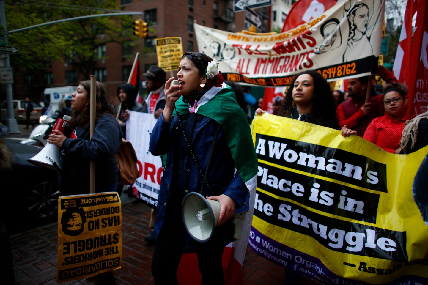 Demonstrators participate in a May Day rally on May 1, 2016 in New York.