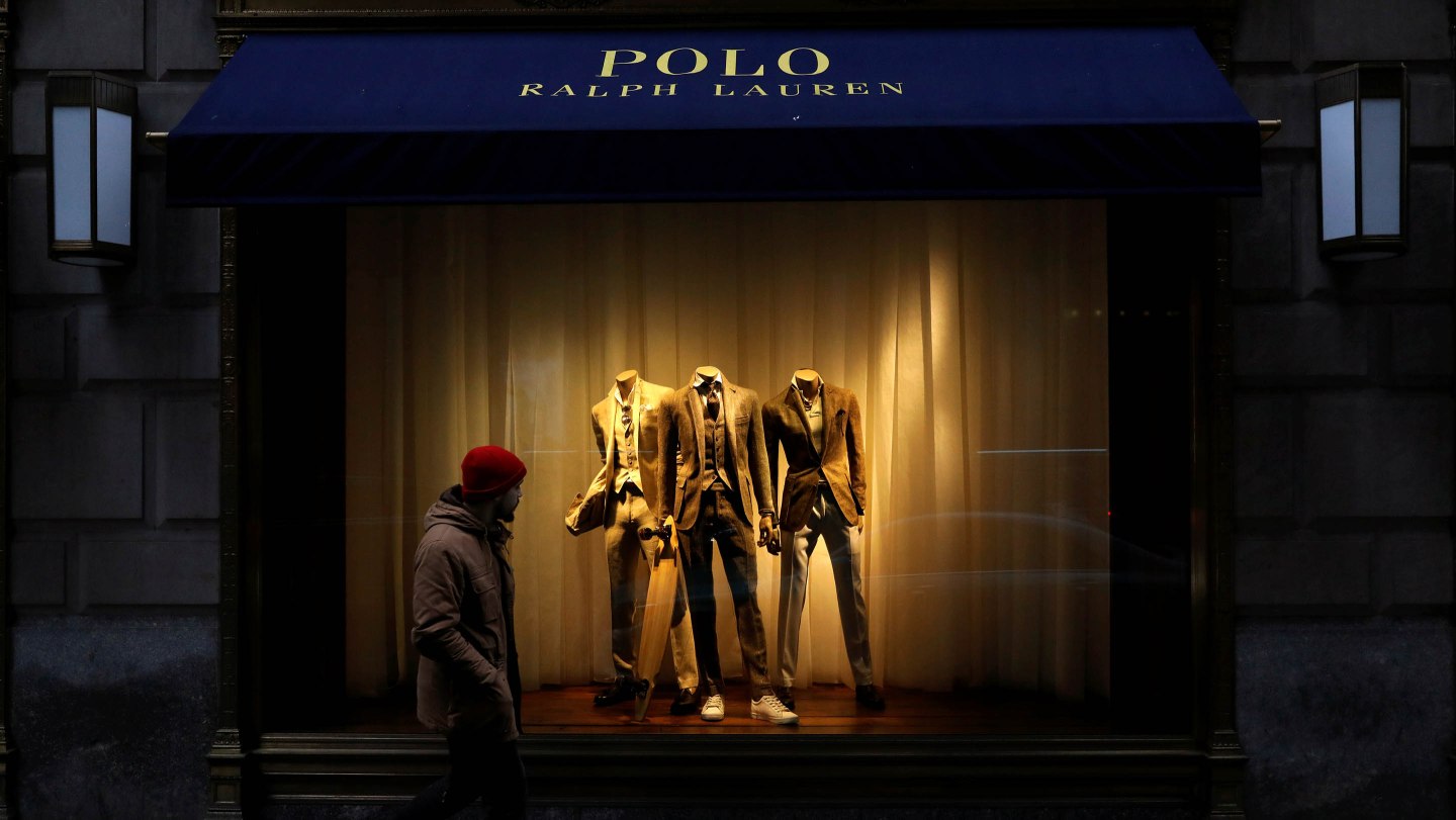 A man walks past Ralph Lauren Corp.'s  flagship Polo store on Fifth Avenue in New York