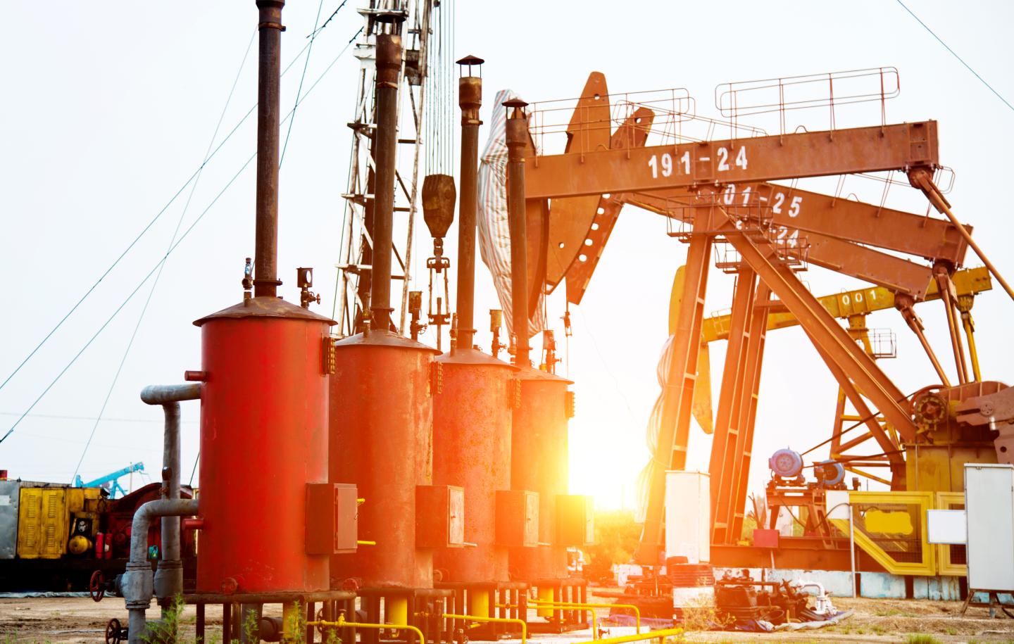 Oil pumps working at sunset.