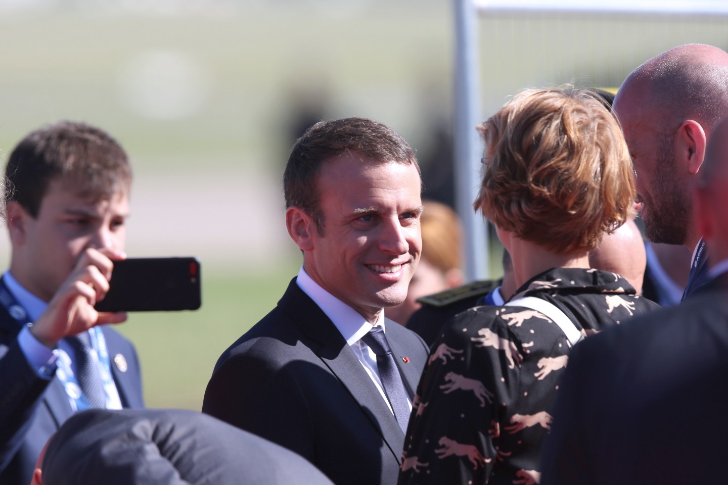 France's President Emmanuel Macron (C) at the 2017 Paris Air Show at Le Bourget Airport.