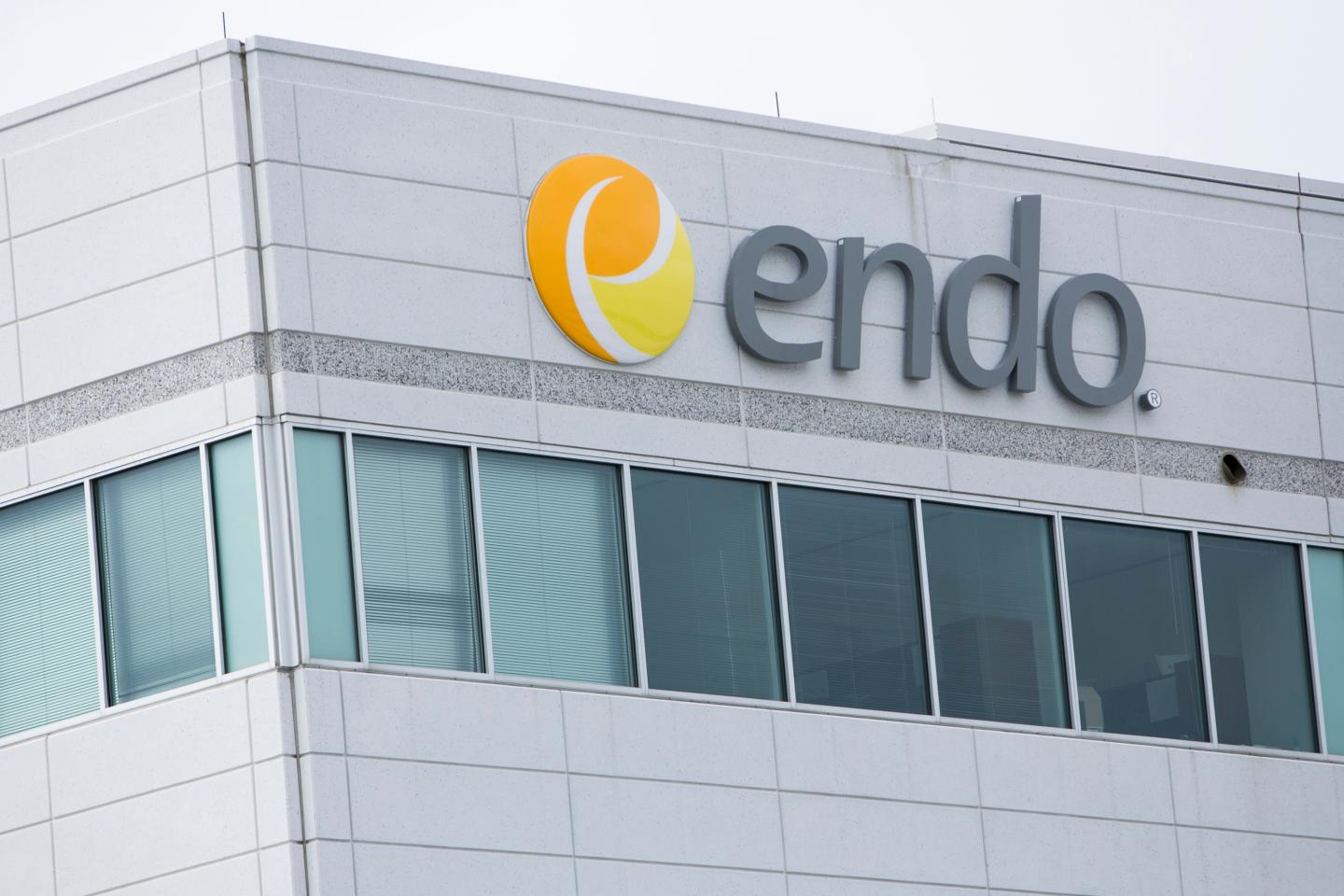 A logo sign outside of a facility occupied by Endo Pharmaceuticals in Malvern, Pennsylvania on May 30, 2015.