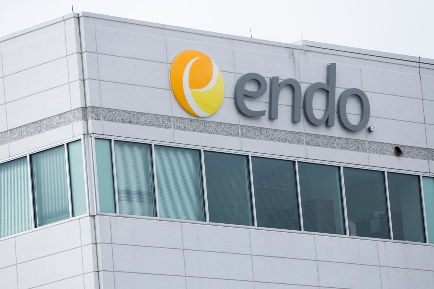 A logo sign outside of a facility occupied by Endo Pharmaceuticals in Malvern, Pennsylvania on May 30, 2015.