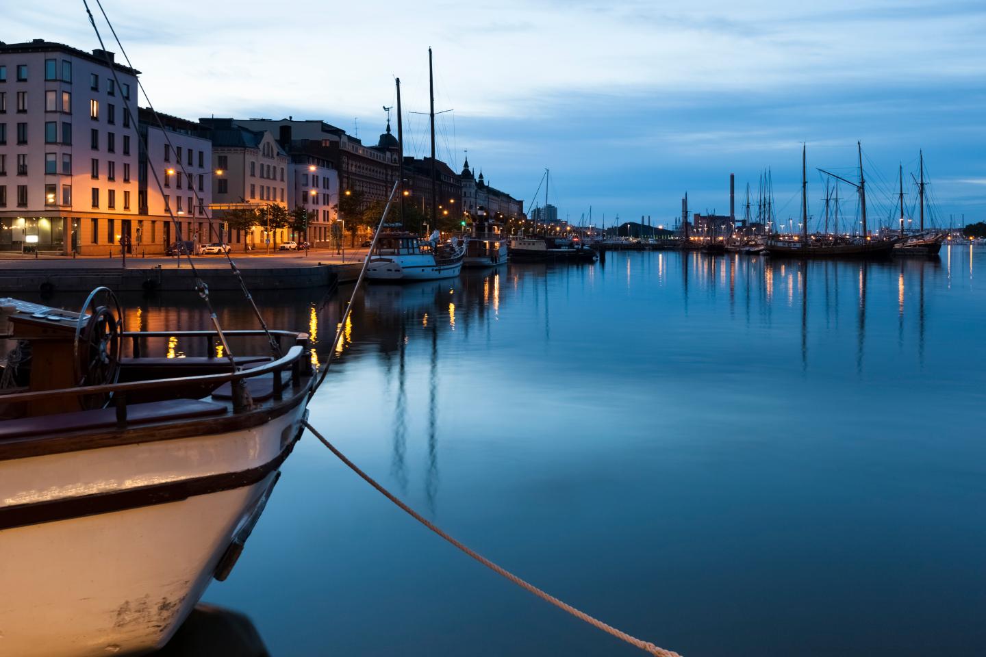 Finland, Helsinki, view to harbour at blue hour