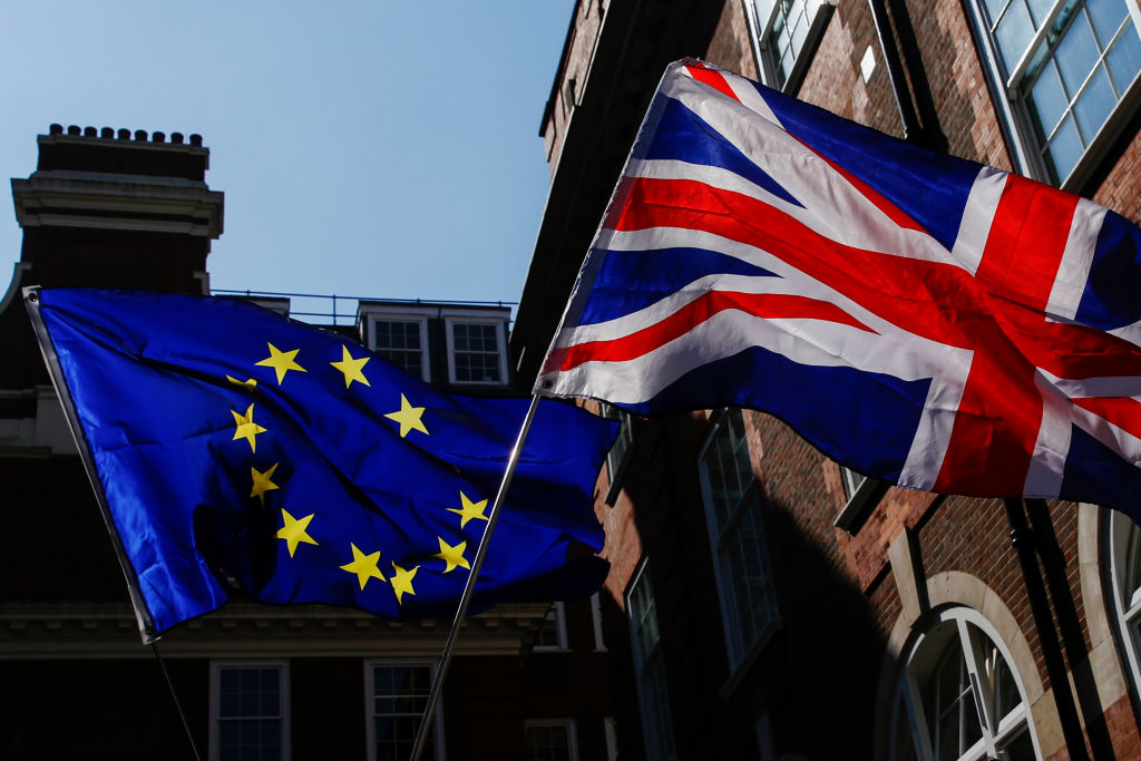 Pro-Europe and anti-Brexit campaigners demonstrate outside the offices of Prime Minister Theresa May's governing party the Conservative Campaign Headquarters in London