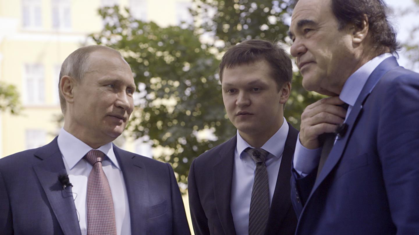 A scene from the Showtime documentary THE PUTIN INTERVIEWS. - Photo:  Komandir/Courtesy of SHOWTIME  Pictured:  Russian President Vladimir Putin, interpreter Sergei Chudinov and Oliver Stone