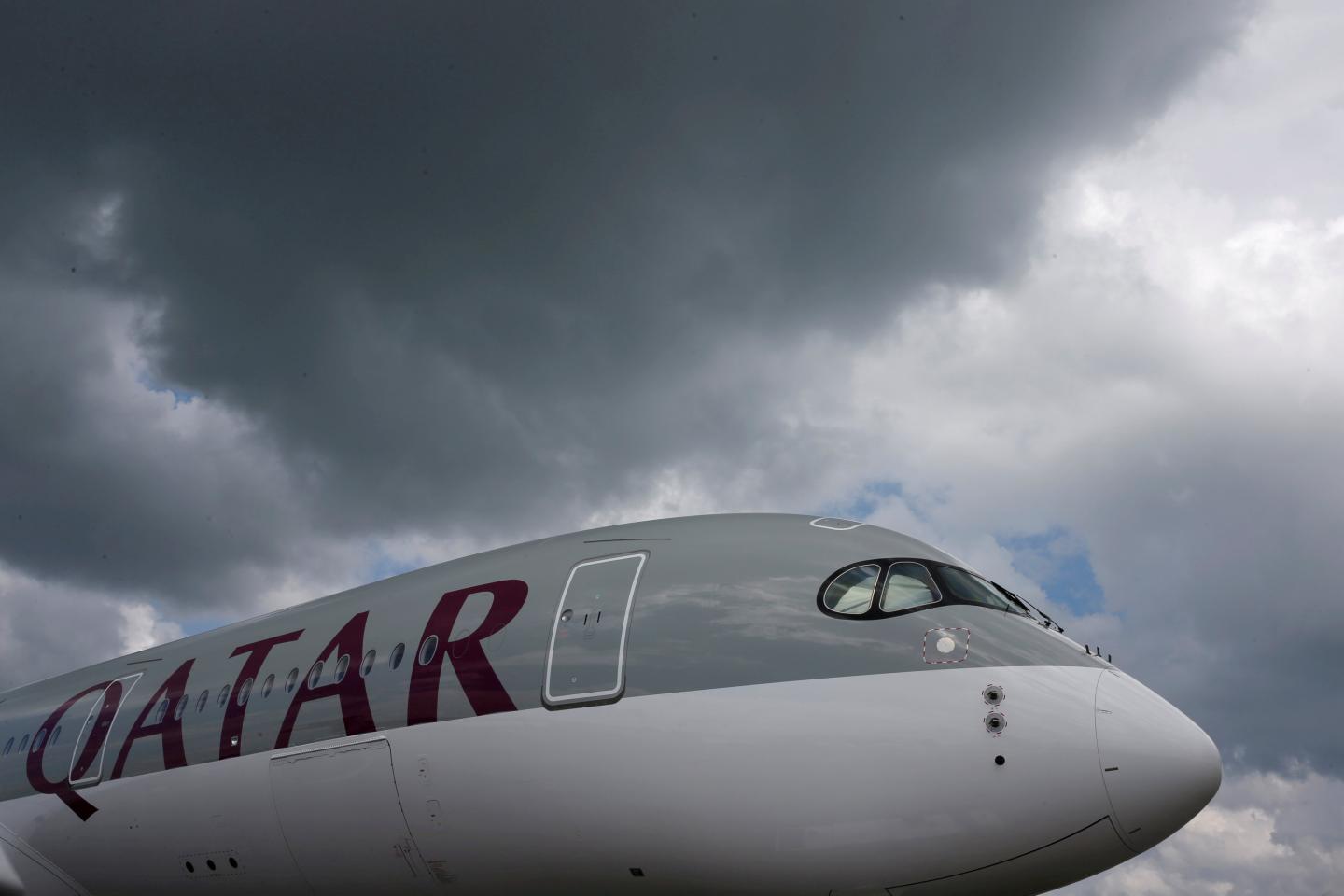 A Qatar Airways Airbus A350 XWB aircraft is displayed at the Singapore Airshow at Changi Exhibition Center