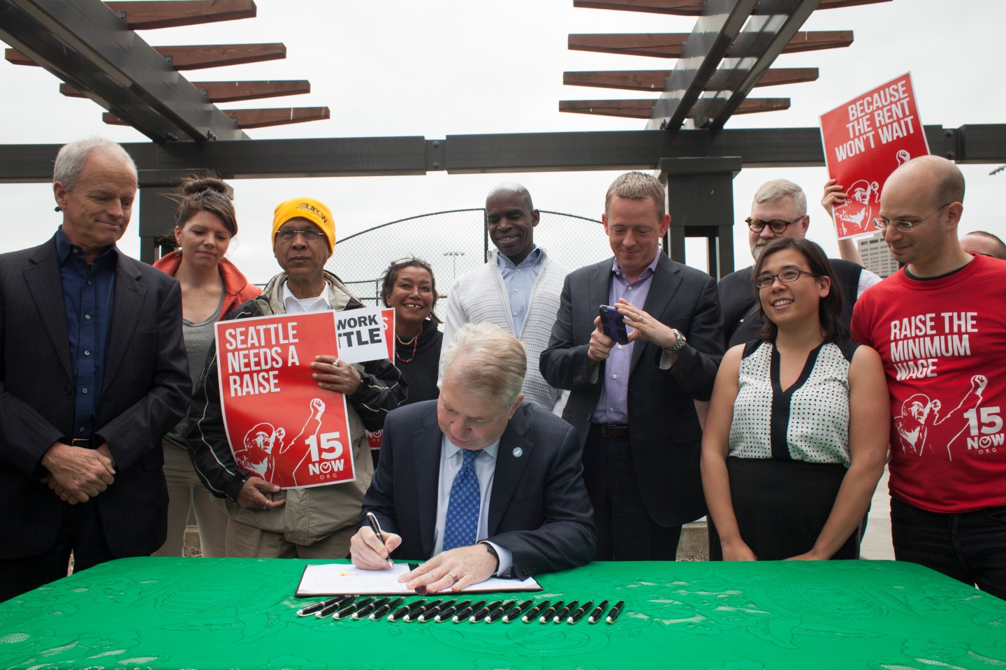 Seattle Mayor Signs Bill Raising City's Minimum Wage To 15 Dollars An Hour
